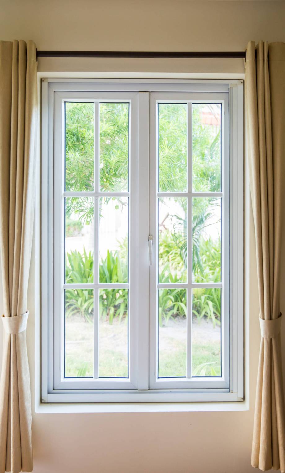 opened window with white frame and curtain